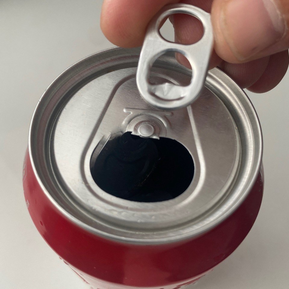 Soda can pull tab after fatigue failure of the connection